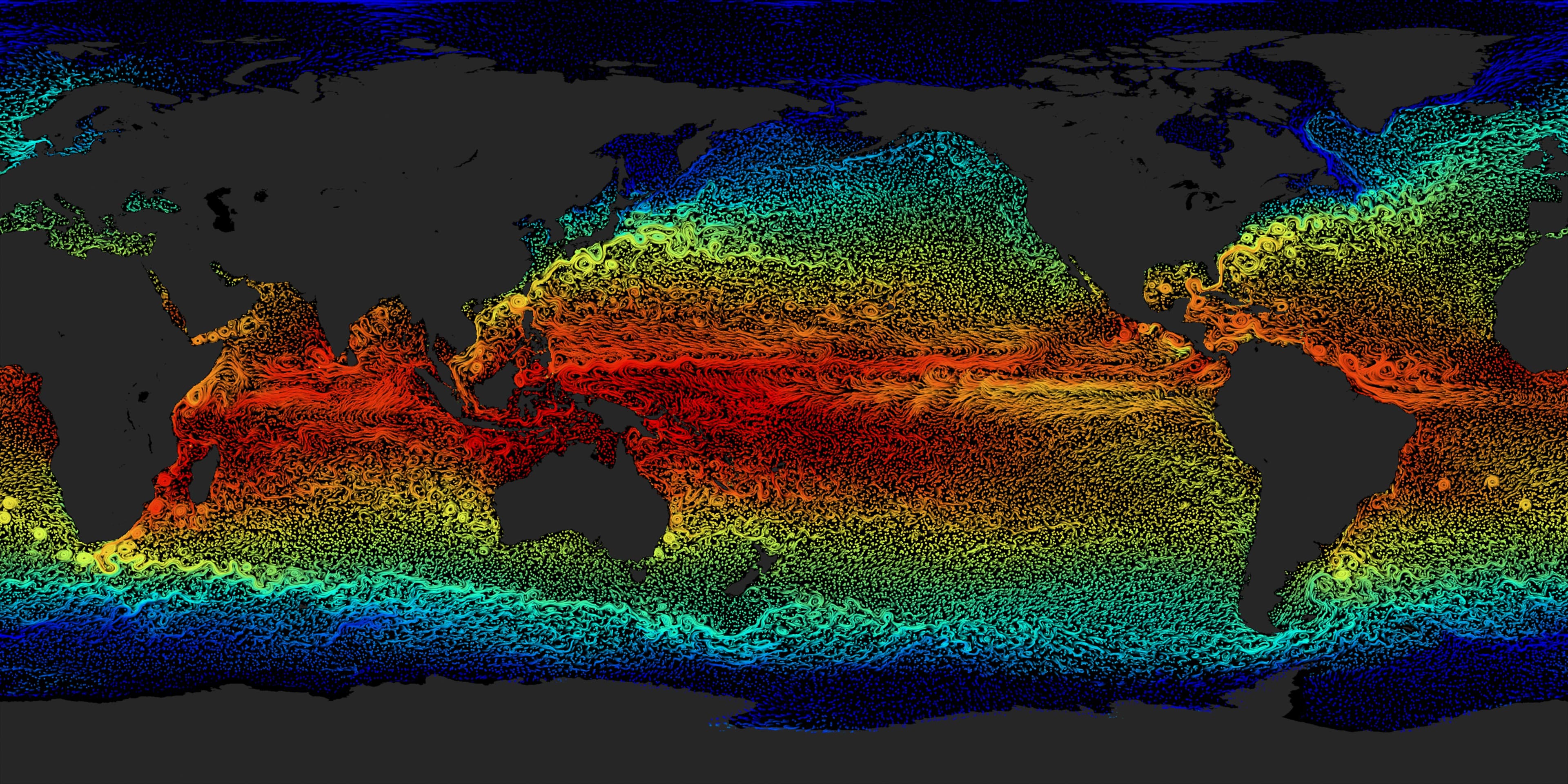 Global ocean surface flows, coloured by sea surface temperature — warm red belt at the equator, cold blue at the poles. Source: NASA Scientific Visualization Studio (Perpetual Ocean / ECCO2).